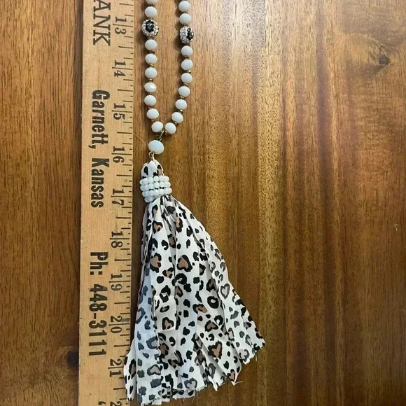 Women’s black and white beaded snow leopard tassel necklace - Picture 4 of 4